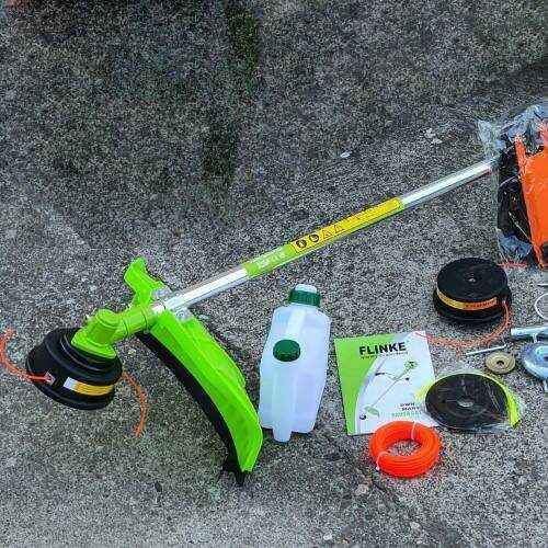 Petrol grass trimmer with accessories